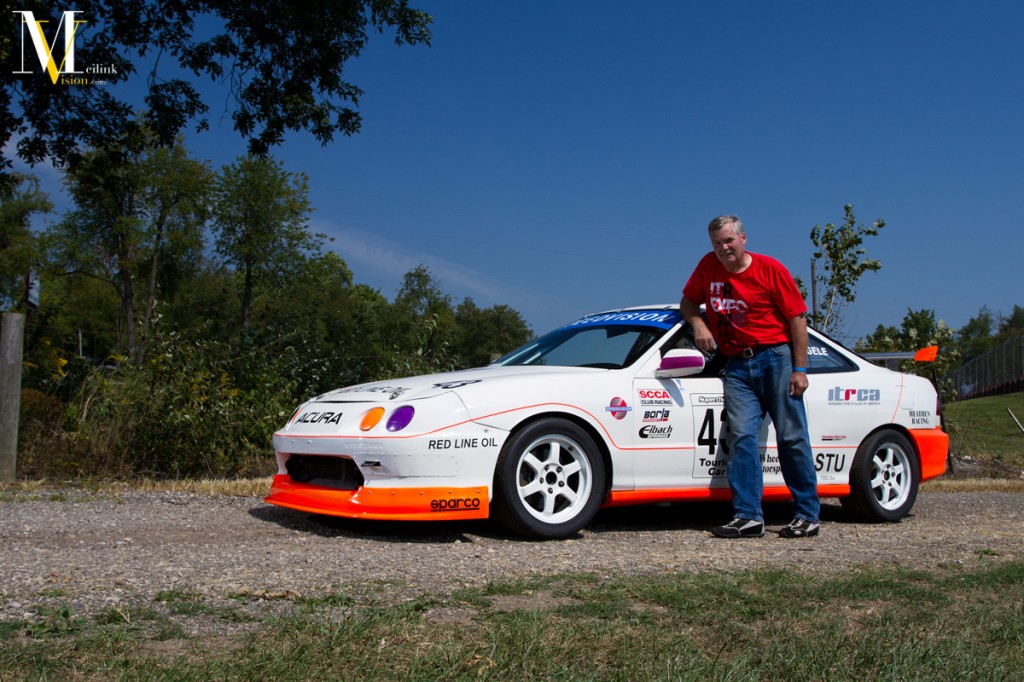 field_bernie_with_car